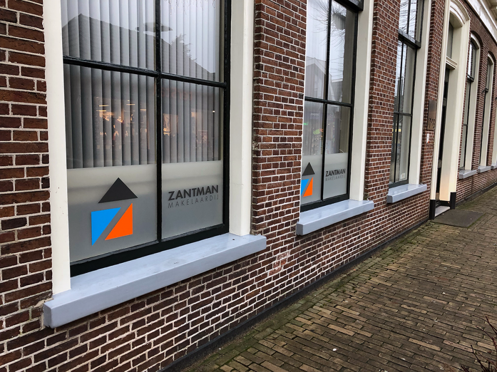 raamfolie-stickers-belettering-reclame-logo-ets-zantman-makelaardij-schoolstraat-burgum-friesland - knapwurk Reclame