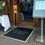 bedrukte deurmat droogloop mat met logo aragosta restaurant leeuwarden friesland